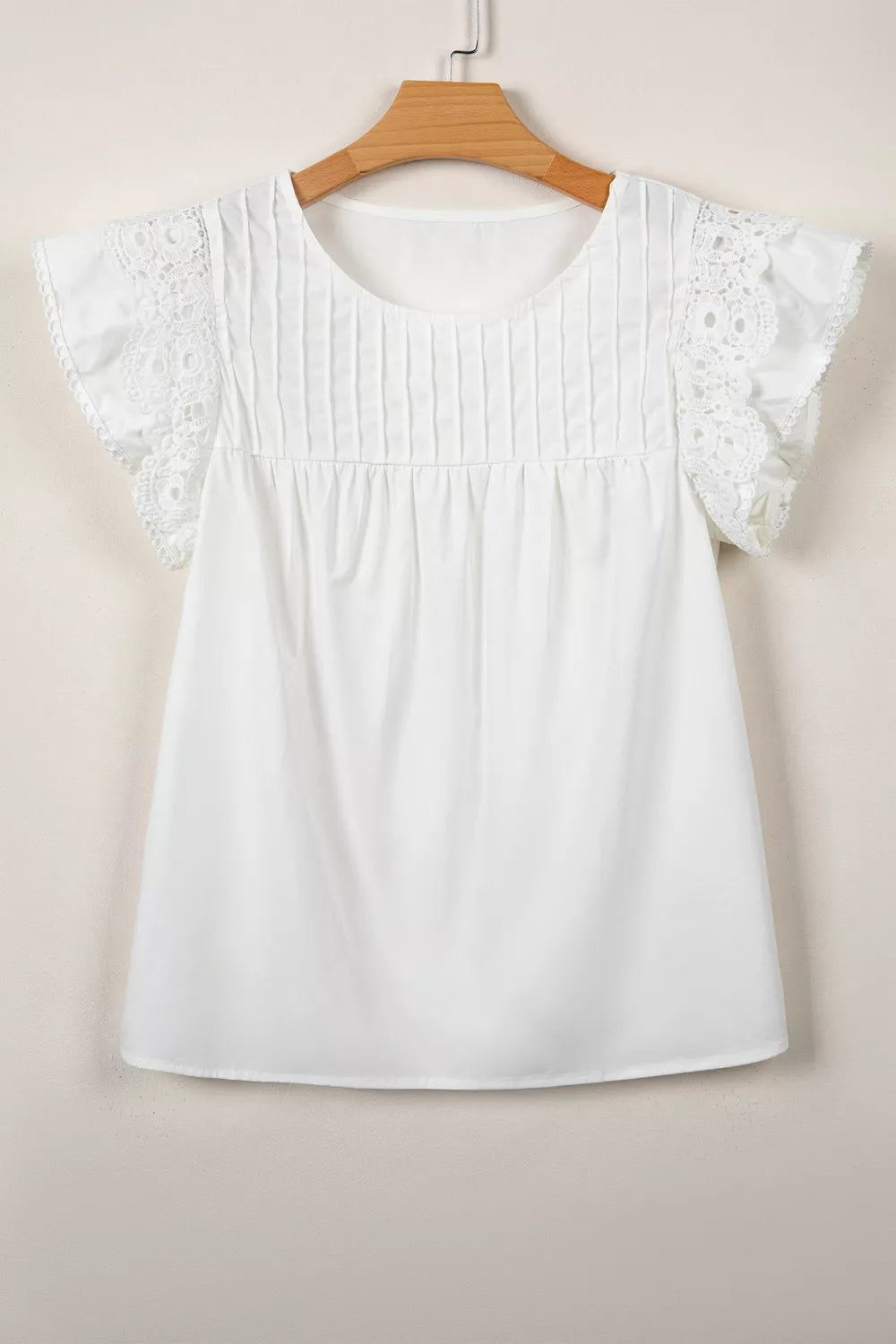 White cotton shirt with lace flutter sleeves and pleated front detail