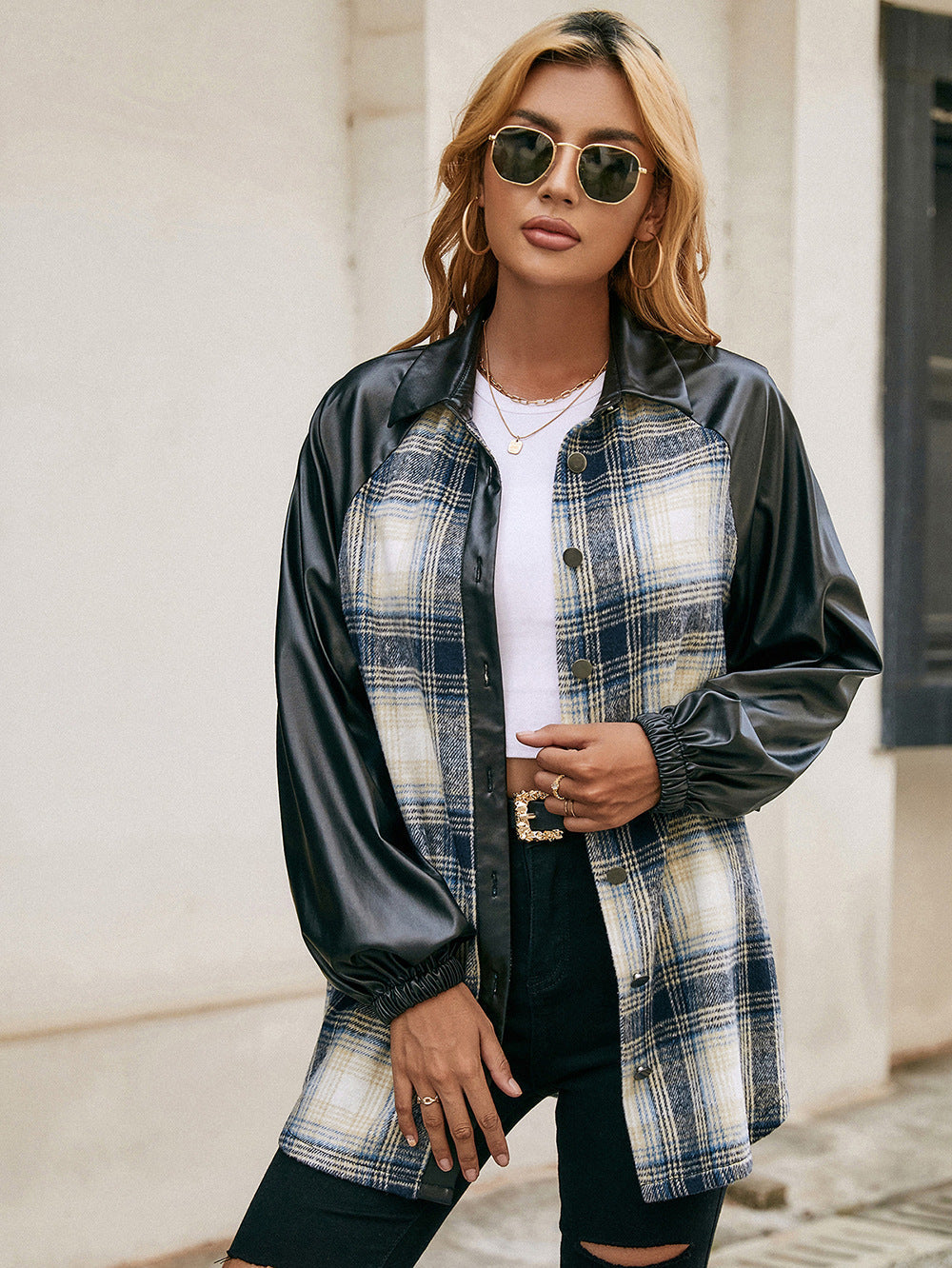 Plaid & faux leather raglan shacket with button front and elastic cuffs.