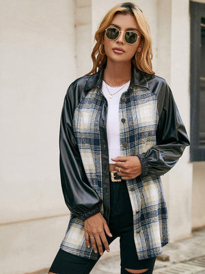 Plaid & faux leather raglan shacket with button front and elastic cuffs.