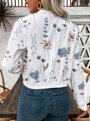 White bomber jacket with a delicate botanical floral print and ribbed cuffs.