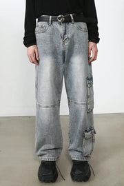 Baggy distressed medium wash denim cargo pants with multiple pockets.
