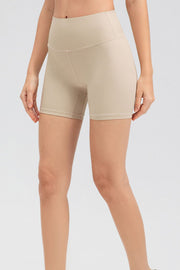 Tan ribbed contour active bike shorts with a high waist.