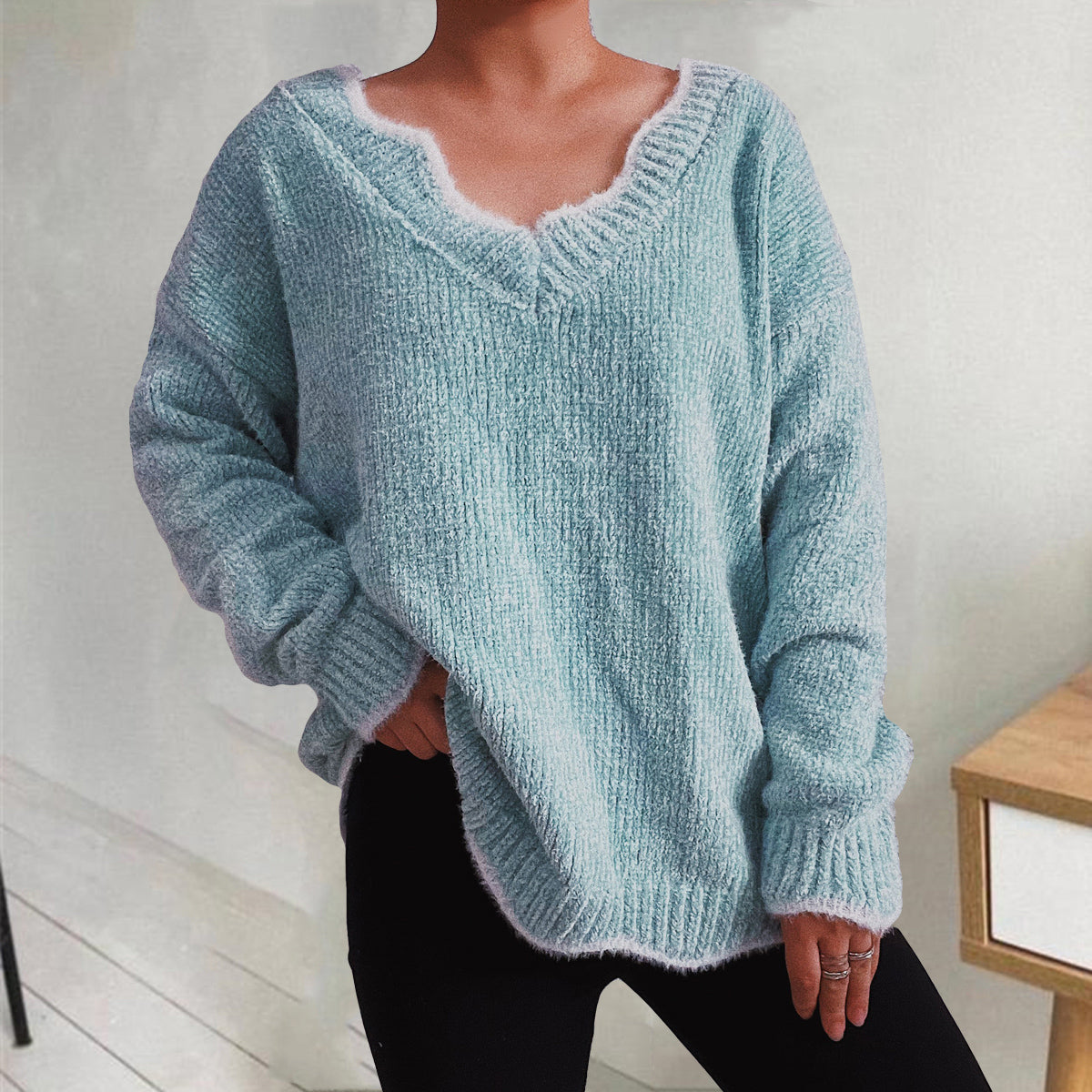 Teal v-neck acrylic sweater with scalloped trim and ribbed cuffs