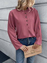 Mandarin collar button-down blouse in a muted rose color with a subtle vertical stripe texture.