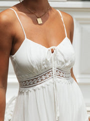 White lace trimmed tiered midi dress with tie front and crochet detail.