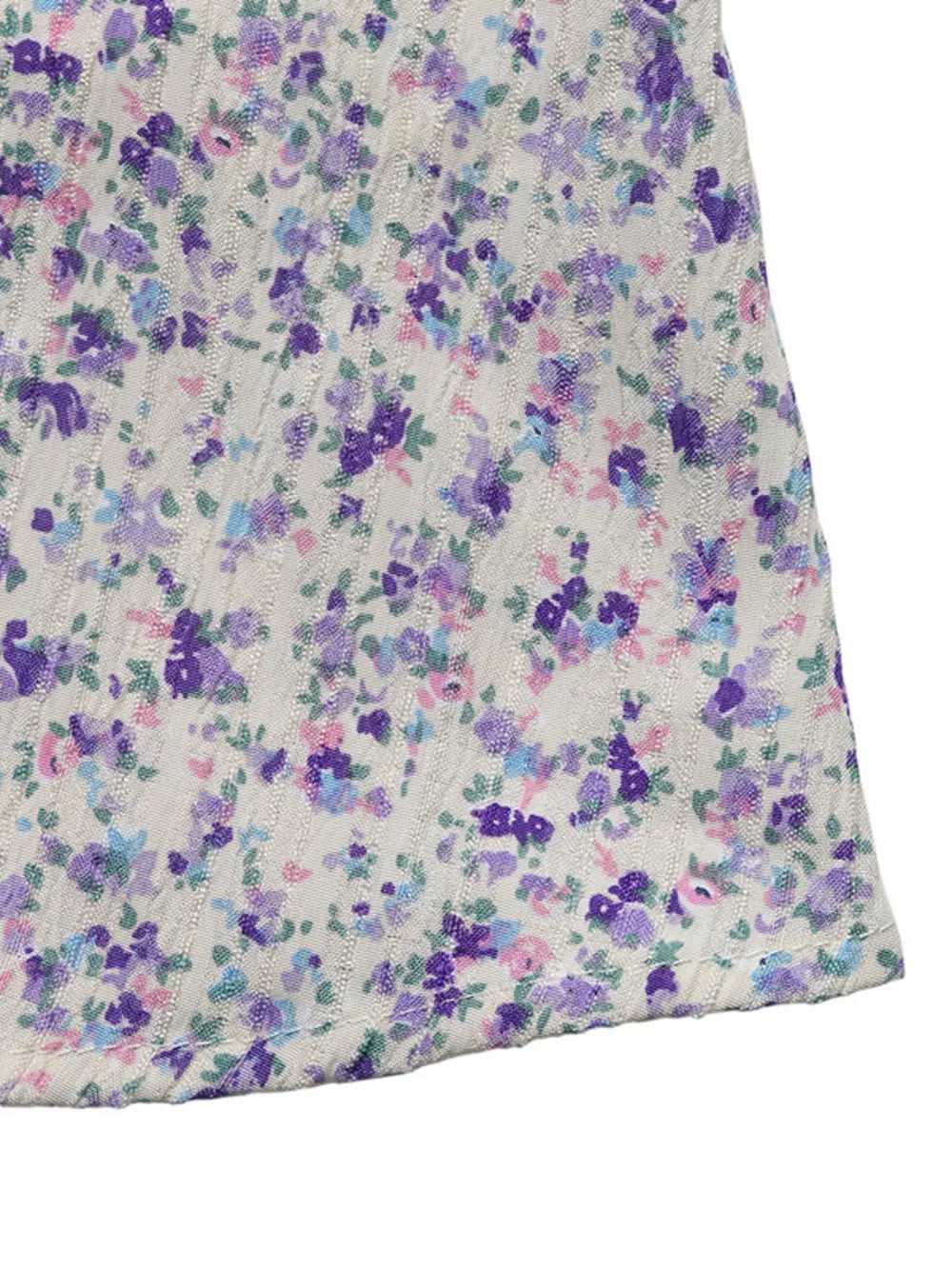 Floral lace-up cami maxi dress with a textured knit and purple floral print.