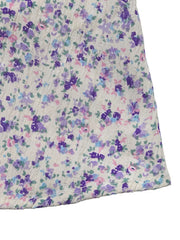 Floral lace-up cami maxi dress with a textured knit and purple floral print.