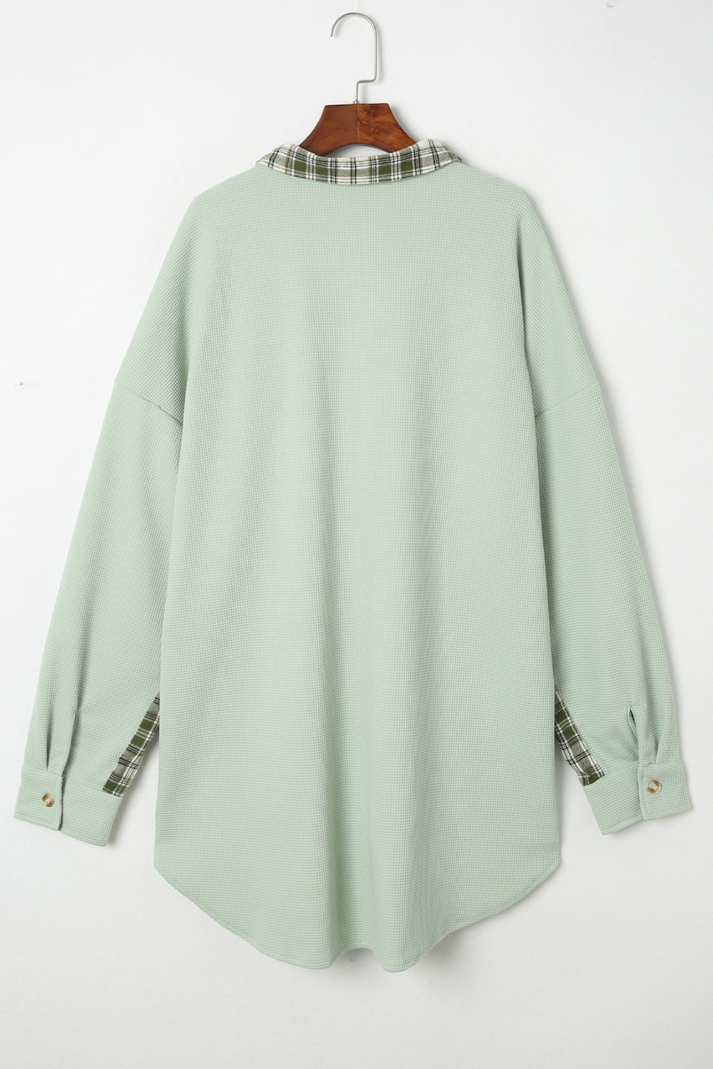 Light green waffle knit overshirt with plaid collar and cuffs, button front.