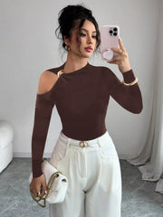 Brown long sleeve t-shirt with cutout shoulder detail and gold ring accent.