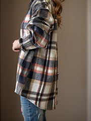Textured plaid shirting jacket with ribbed cuffs in multicolor, shown on a model.