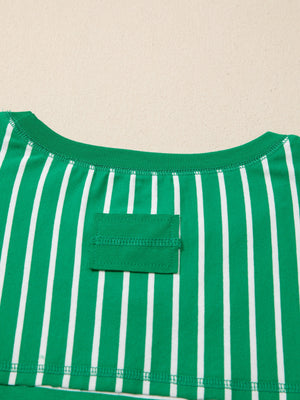 Green and white striped cotton t-shirt with crew neck and chest pocket detail.