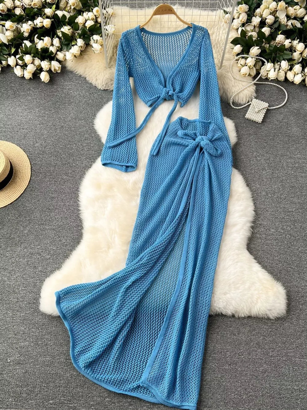 Blue knit tied crop top with long sleeves and high slit maxi skirt set