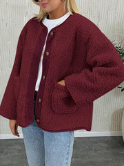 Burgundy teddy-texture button-up jacket with corduroy trim and pockets.