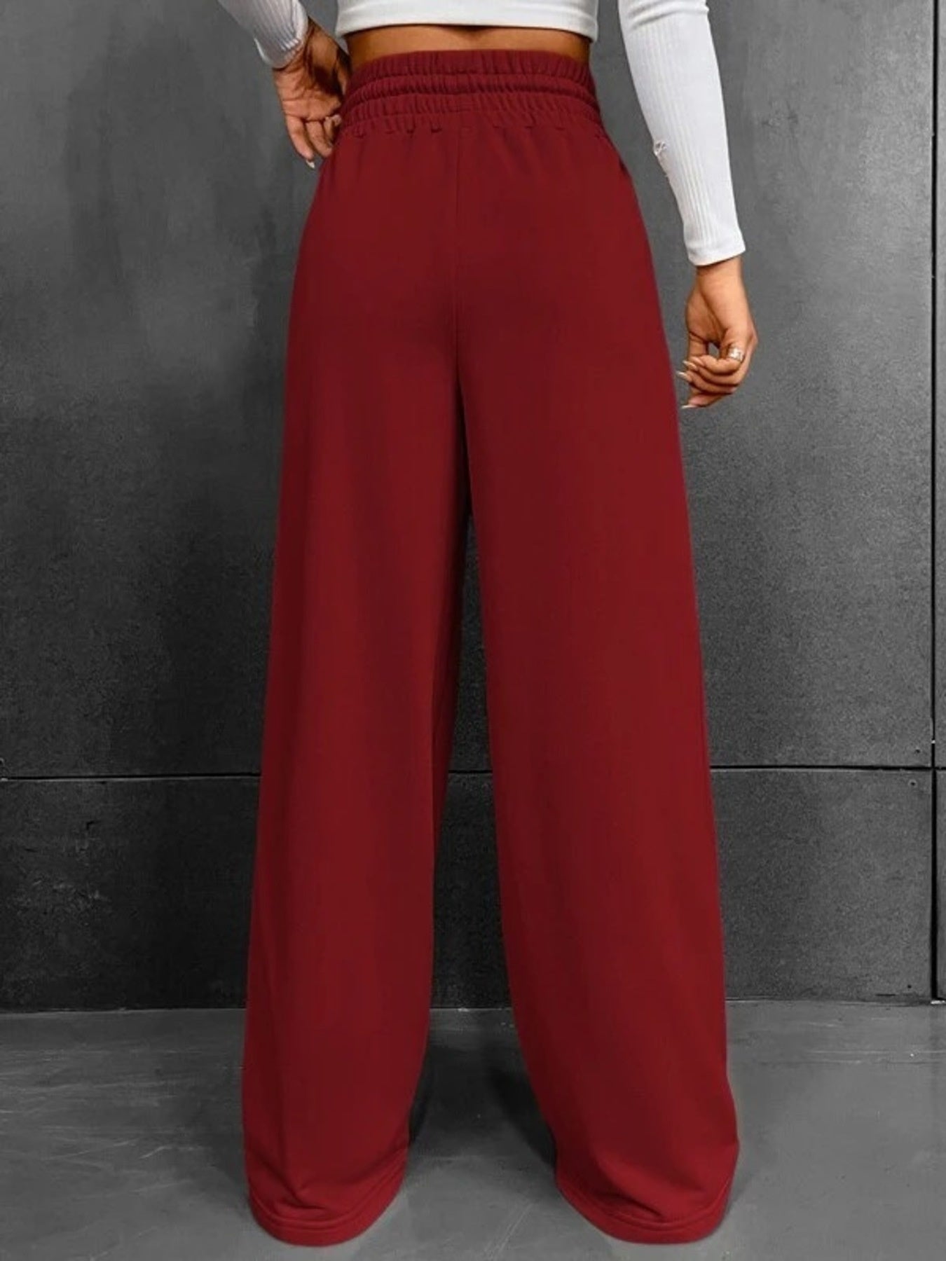 Wine Red relaxed wide-leg sweatpants with drawstring waist and pockets