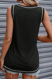 Black tank top with white contrast stitching and a rhinestone smiley face graphic.