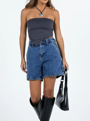 Utility denim carpenter shorts in dark blue wash with a relaxed fit and utility pockets.