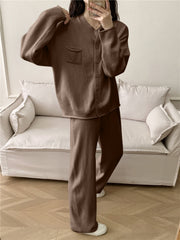 Brown ribbed knit cardigan with pocket and wide leg pants set.