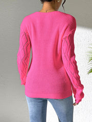 Lace-trimmed openwork knit sweater in strawberry pink with diamond pattern sleeves.