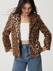 Leopard print faux fur blazer with buttoned front and lapel collar.
