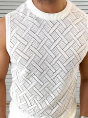 White knit sleeveless sweater with a geometric pattern and crew neck.