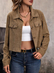 Caramel textured corduroy cropped utility jacket with button pockets and collar.