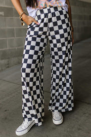 Checkerboard palazzo trousers in black and white, wide leg, casual fit.