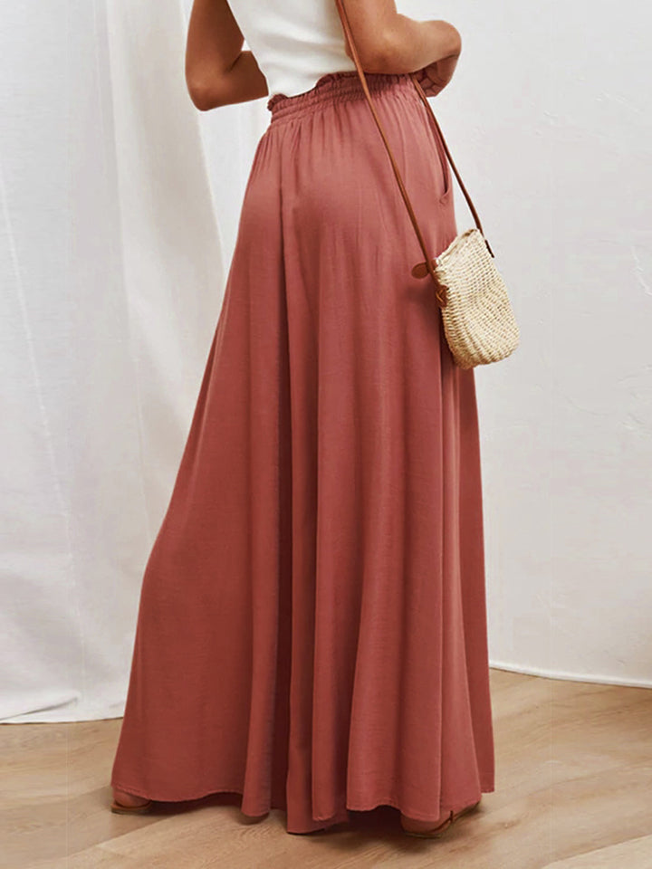 Gathered waist palazzo pants in mocha, featuring a wide leg and elastic waistband.