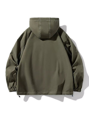 Oversized hooded zip jacket in dark green with contrast stitching and drawstring hem.