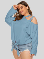 Light Blue shoulder-buckle cutout tie-front long sleeve blouse with buckle detail.