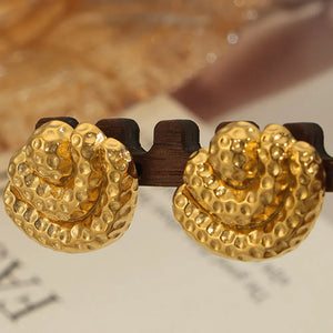 Textured gold shell stud earrings with hammered finish