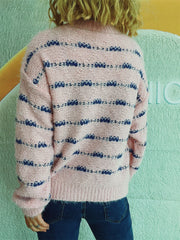Textured stripe crew neck sweater in blush pink with blue accents, acrylic knit.