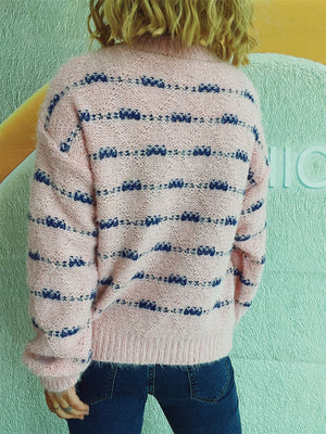 Textured stripe crew neck sweater in blush pink with blue accents, acrylic knit.