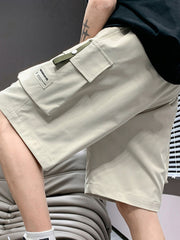 Men's lightweight cargo shorts in apricot with drawstring and utility loop detail.