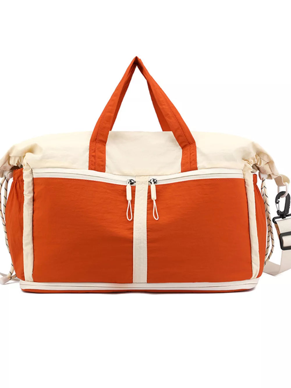 Vibrant color-block travel bag with orange and cream panels, dual zippers, and rope handles.