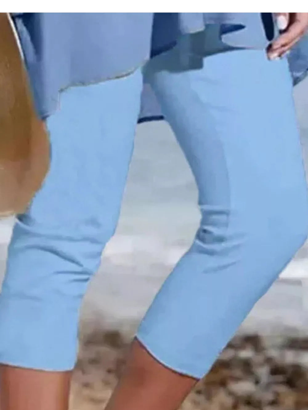 Light blue cropped casual leggings with a relaxed fit, perfect for everyday wear.