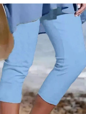 Light blue cropped casual leggings with a relaxed fit, perfect for everyday wear.