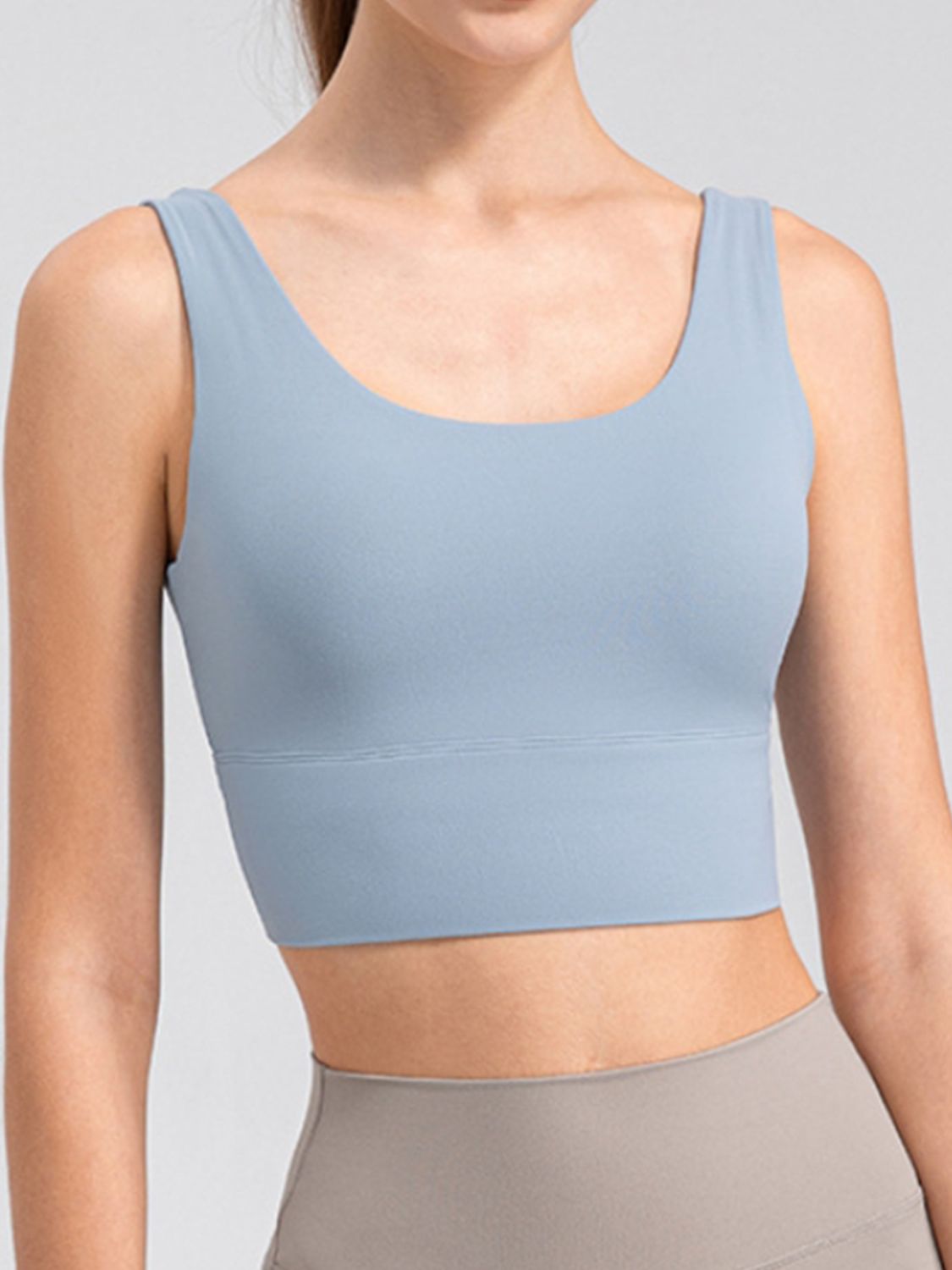 Light blue performance crop top with scoop neck and wide band