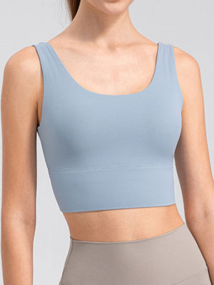 Light blue performance crop top with scoop neck and wide band
