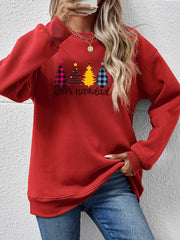 Red Feliz Navidad graphic crewneck sweatshirt with plaid and yellow Christmas trees.