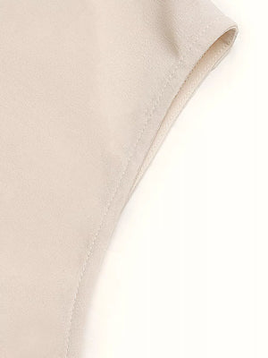 Cream polyester A-line midi dress detail showing clean seams and hem.