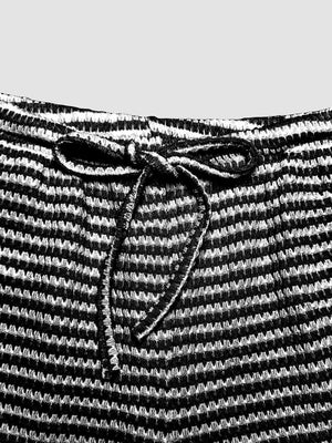 Black and white striped maternity pants with drawstring waist