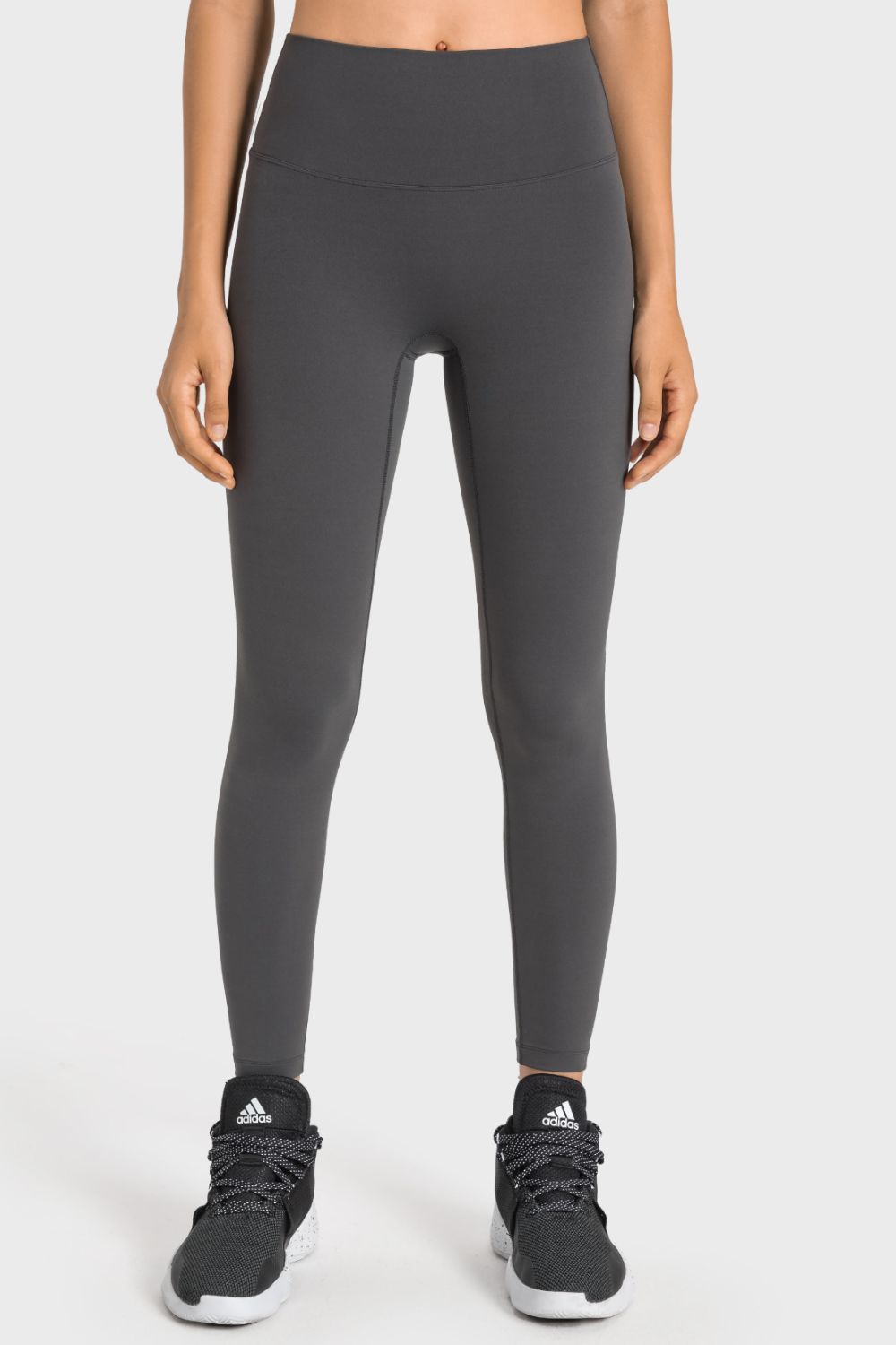 Gray seamless high-waist performance leggings with a full-length cut.