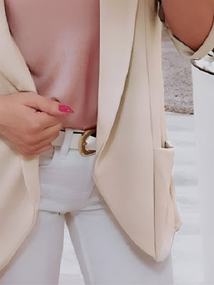 Open-front blazer in Dust Storm with rolled sleeves, styled with a pink top and white pants.