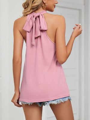Blush pink cami with ruched high neck and tie back bow detail.