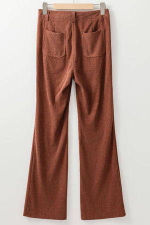 Brown corduroy flared leg trousers with back pockets.