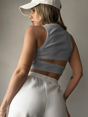 Ribbed cutout crop top in Moss, Orange, Black, White, Caramel, Lemon, Lavender, Gray, or Mid Green.