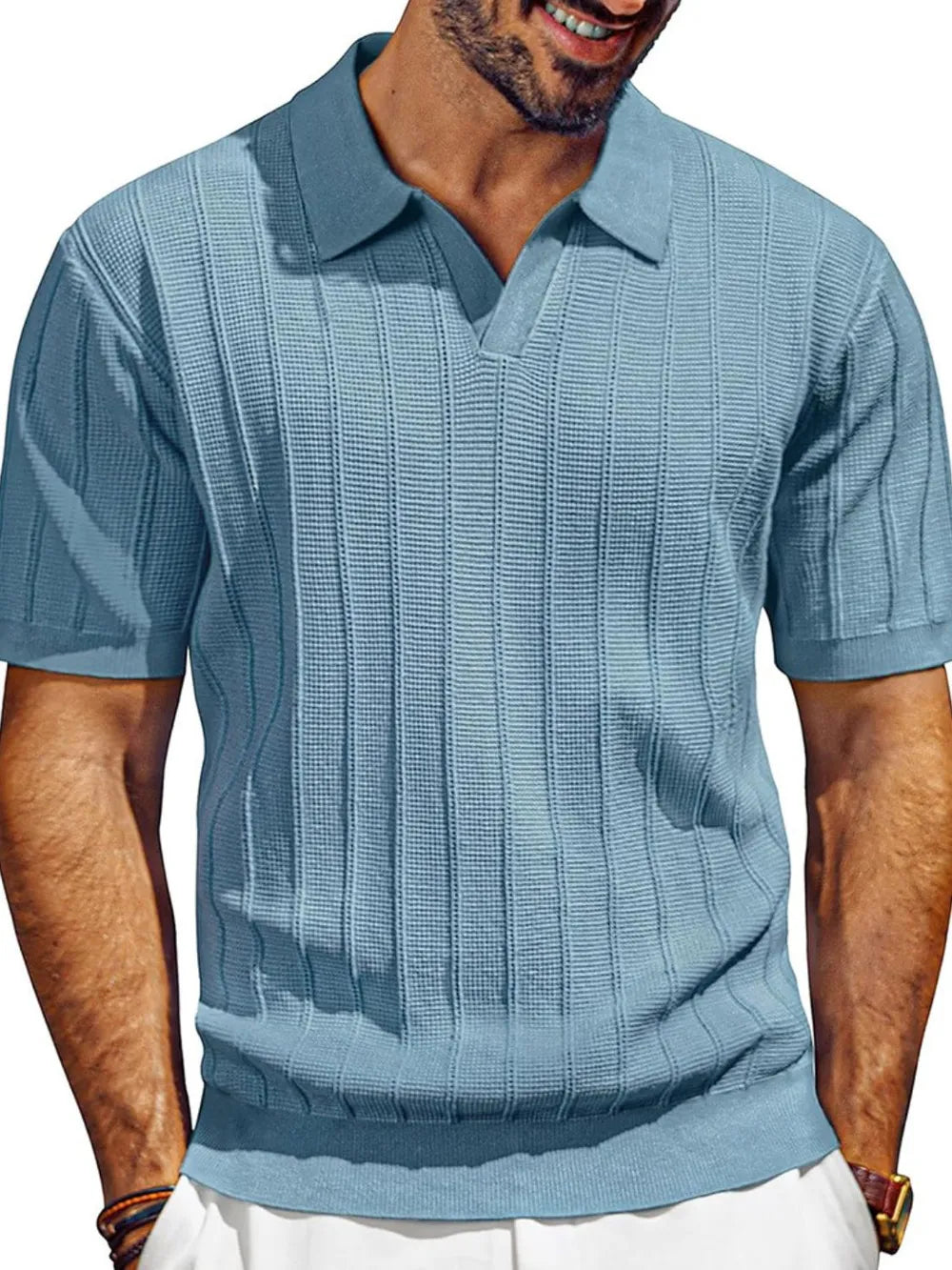 Light blue ribbed knit polo shirt with open placket and short sleeves.