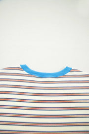 Casual striped mini dress with pockets, cream with blue, red, and navy stripes and a blue neckline.