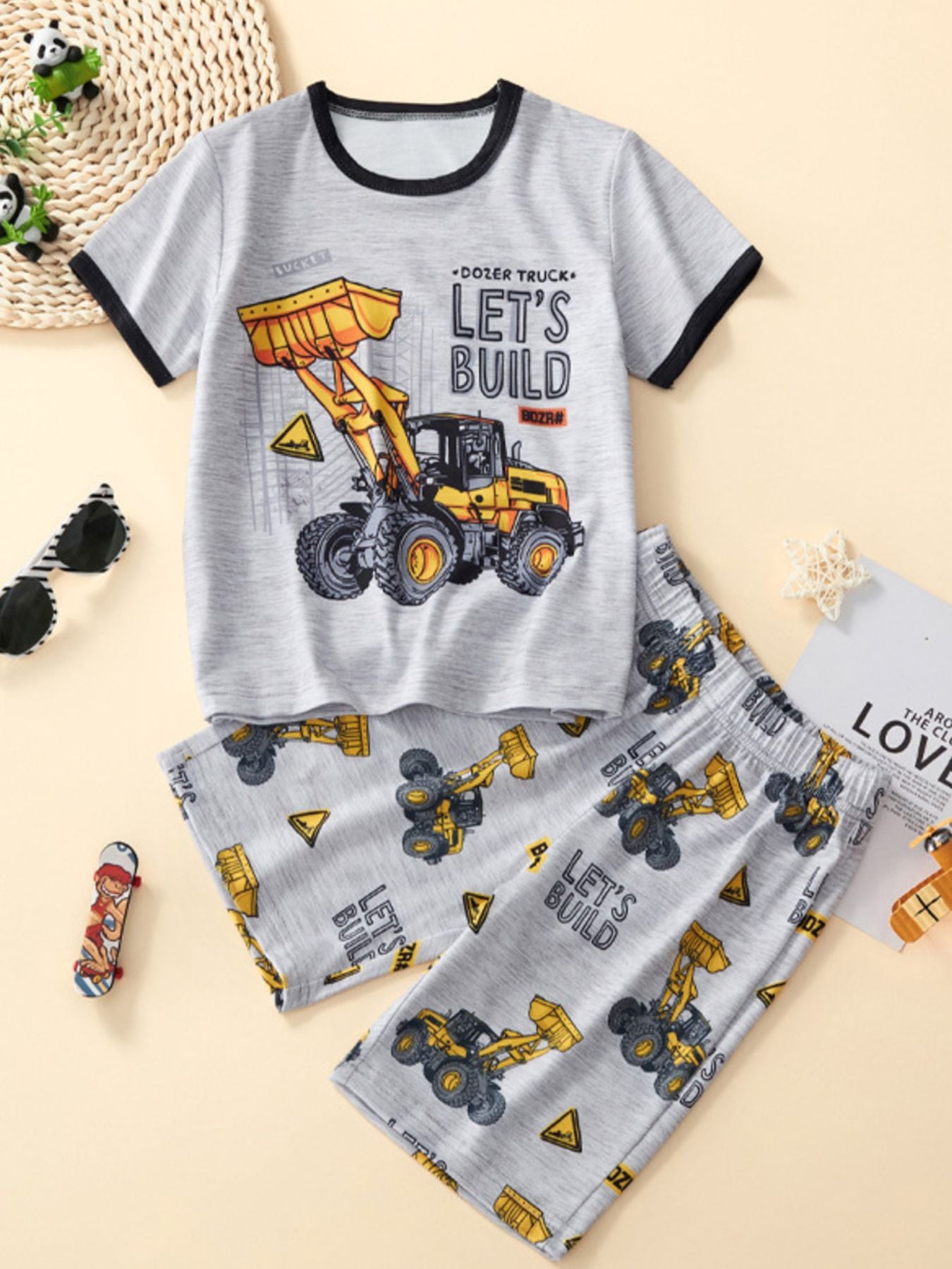 Kids grey cotton crew neck tee and shorts set with bulldozer print and "Let's Build" text.