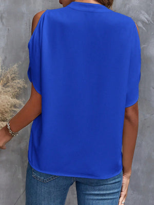 Royal blue polyester open-shoulder blouse with short sleeves and a keyhole detail.